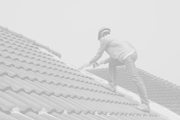 Man repairing roof fixture with a hard hat on.